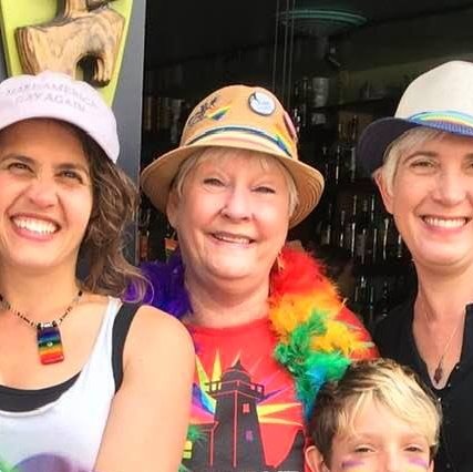 image of Patti W (in the center) with her daughter and daughter in law